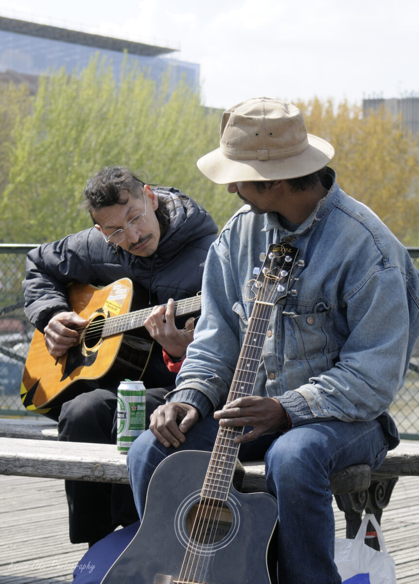 Musicians playing on Pont des Arts, Paris, France
