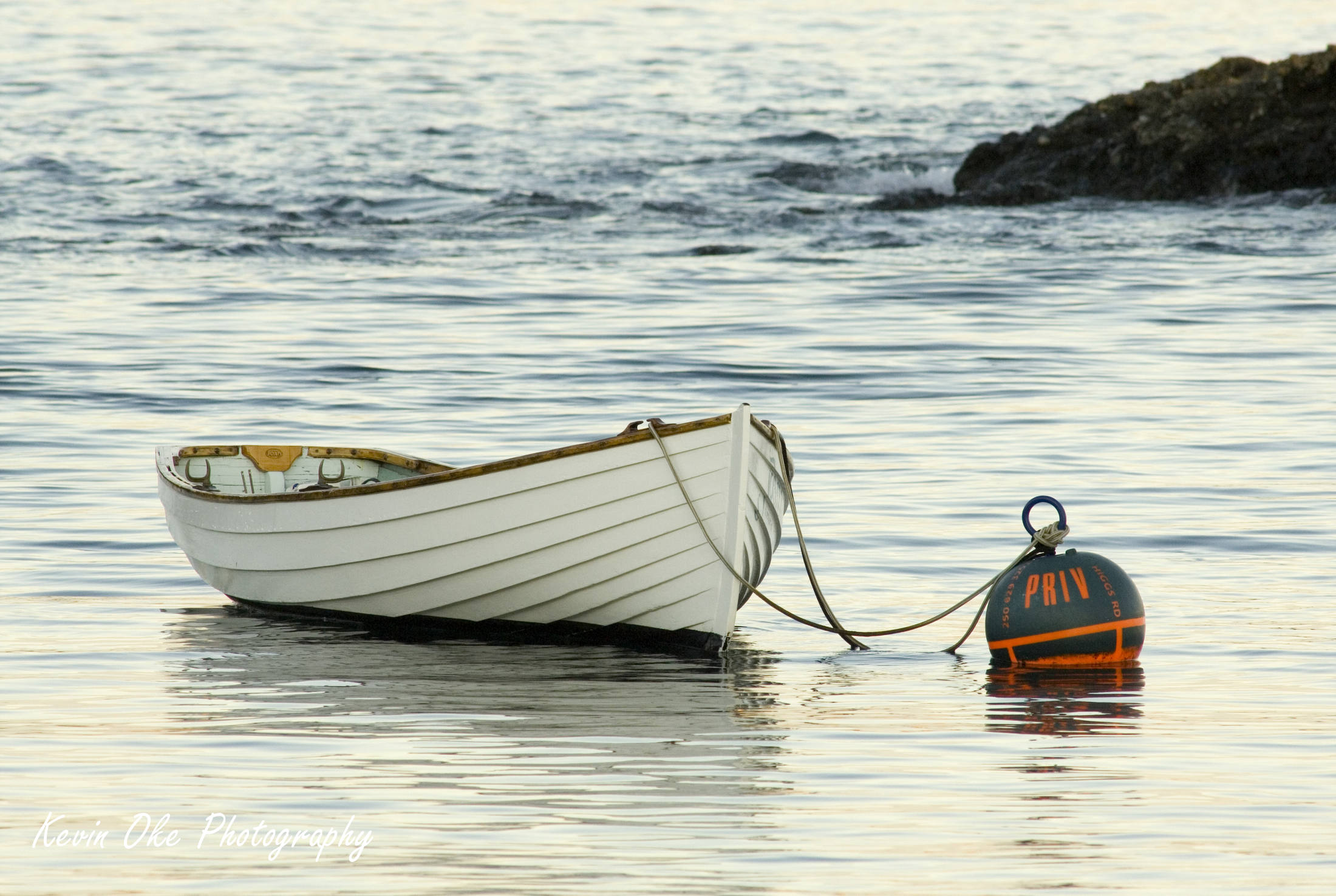 Dinghy at a mooring bouy