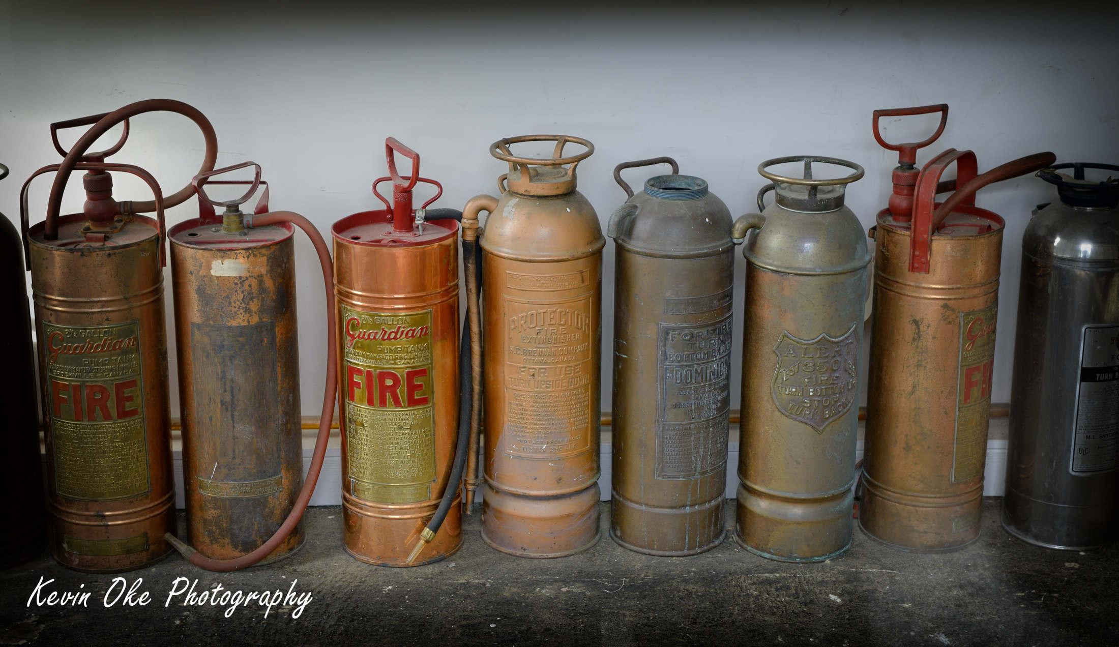 Display of old fire extinguishers, Ganges, Salt Spring Island, British Columbia, Canada