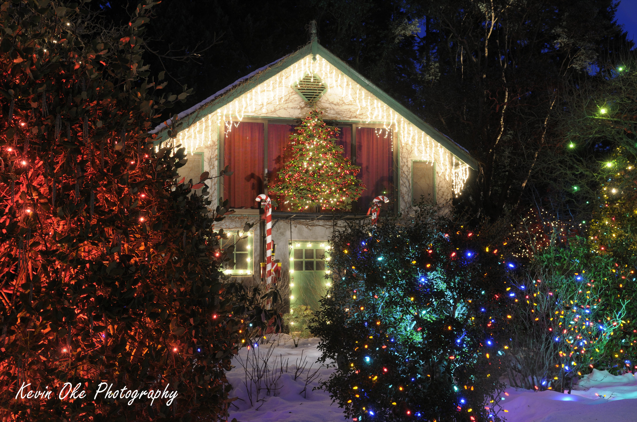 Christmas lights on a small house at Butchart Gardens, Brentwood Bay, BC, Canada.